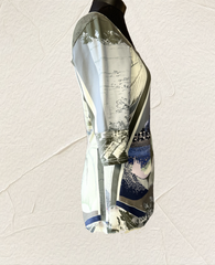 Side view of Save the Queen Blouse featuring water town print and boat neck design, perfect for versatile elegance.