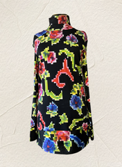 Colorful Marccain Nonograms Blouse with playful floral design, perfect for a stylish wardrobe upgrade.
