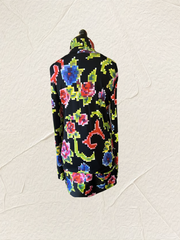 Marccain Nonograms Blouse featuring colorful floral print on a black background, stylish and trendy for modern wardrobes.