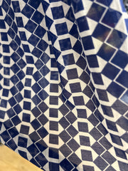 Close-up of the Seventy Blue Pattern Petti Skirt showcasing a vivid blue and white geometric pattern.