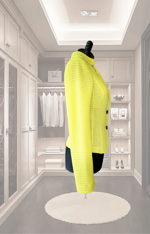 Marccain Yellow Jacket displayed in stylish closet, showcasing bright yellow knit fabric and modern design.