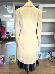Back view of the Laurel Creamy Wool Coat, showcasing its elegant design and quality craftsmanship.