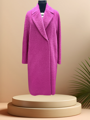 Marccain hot pink coat made from virgin wool and alpaca for luxurious comfort, displayed on a pedestal.