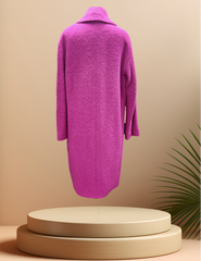 Back view of a luxurious Marccain hot pink coat made from virgin wool and alpaca, displayed elegantly on a pedestal.