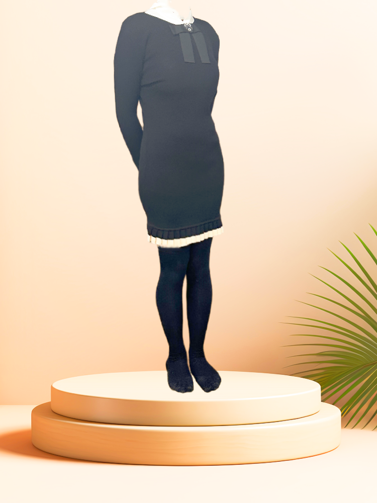 Crisca black wool dress displayed on a pedestal, highlighting its stylish design and luxurious 100% virgin wool fabric.