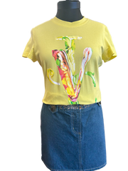 Versace Yellow T-Shirt featuring an intricate flower design, perfect for spring and summer styling.