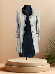 Save the Queen Leather coat displayed on a mannequin, featuring a stylish design and lightweight fabric, perfect for spring.