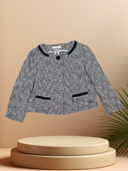LAUREL SPRING JACKET displayed on a pedestal, featuring stylish design with navy accents, perfect for spring outings.