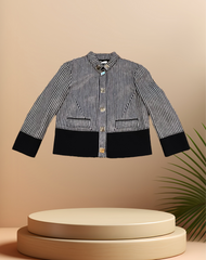 Versace black and white checked jacket displayed against a neutral background, showcasing its elegant design and style.