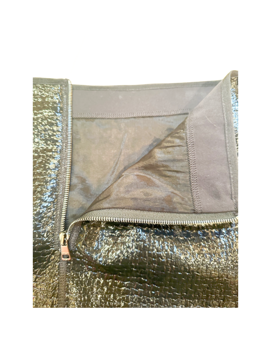 Interior view of Marccain short skirt showing edgy leather look fabric and zipper detail, illustrating superior craftsmanship.