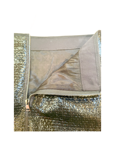 Interior view of Marccain short skirt showing edgy leather look fabric and zipper detail, illustrating superior craftsmanship.