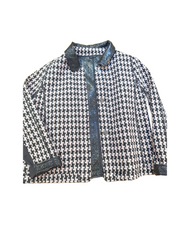 Marccain reversible jacket featuring black and white houndstooth pattern, stylish and versatile for fashion enthusiasts.