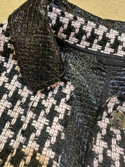 Close-up of Marccain Reversible Jacket showcasing black leather collar and Houndstooth fabric detail.