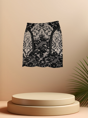 Marccain skirt featuring a black and white lace print on a minimalist display, ideal for elevating your style.
