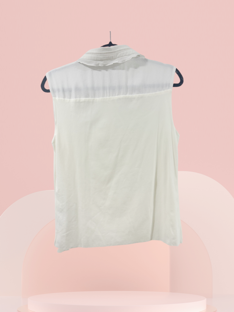 Back view of Marccain white blouse with flounce collar, perfect for any occasion, crafted from durable microfiber material.