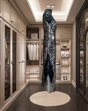 Striking After Six Sequins Dress displayed in an elegant dressing room, showcasing its shimmering silver design.