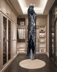 Striking After Six Sequins Dress displayed in an elegant dressing room, showcasing its shimmering silver design.