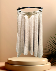 Seventy Circular Skirt displayed on a hanger, showcasing a lightweight wool blend design for comfort and style.