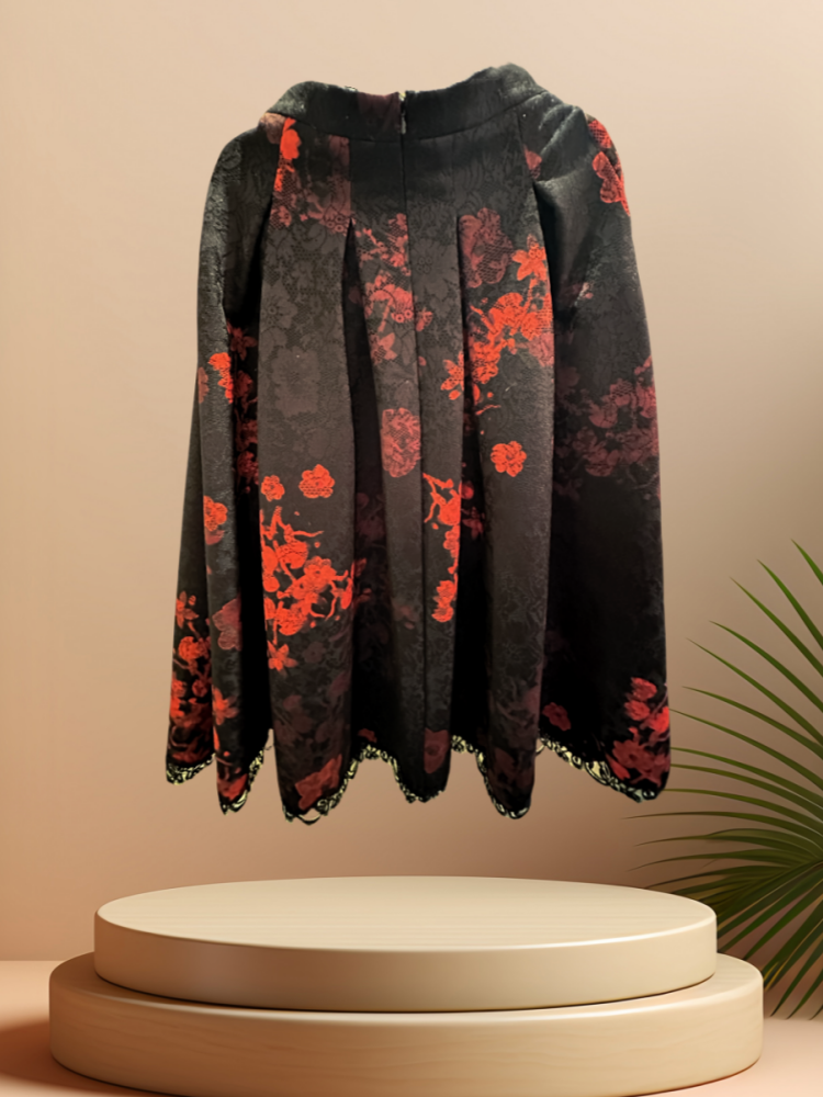 Cavalli Class Flower Pattern Lace Skirt in black with red floral design, displayed elegantly on a pedestal.