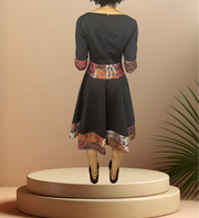Cavalli Class Black Dress showcasing sophisticated back design with elegant totem details, ideal for special occasions.