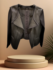 Marccain black jacket featuring zig zag pattern and zip closure, ideal for a trendy rock-inspired look.