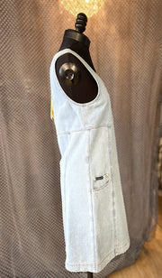 Side view of Escada Denim Dress featuring a sleeveless A-line design in light denim fabric with a pocket.