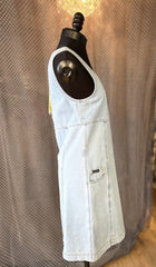 Side view of Escada Denim Dress featuring a sleeveless A-line design in light denim fabric with a pocket.
