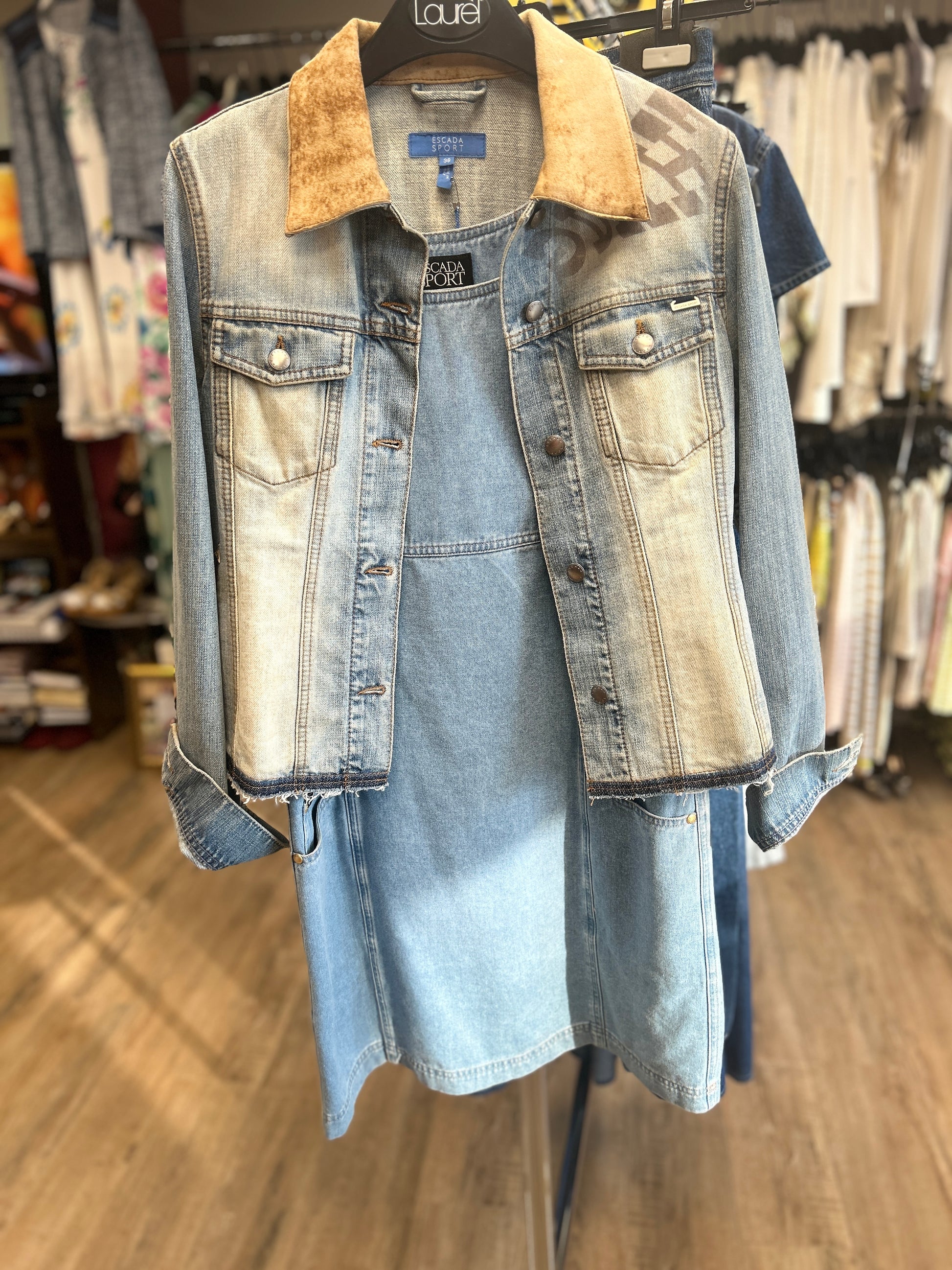 Escada denim dress with sleeveless vest style, showcasing a flattering A-line cut in high-quality cotton fabric.