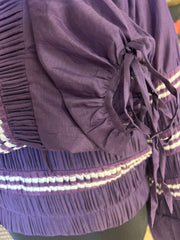 Jean Paul Gaultier purple blouse with puff sleeves and intricate detailing, made of 70% cotton and 30% silk.