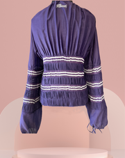 Jean's Paul Gaultier purple blouse with puff sleeves and detailed stitching, made of cotton and silk for a luxurious look.