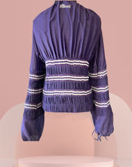 Jean's Paul Gaultier purple blouse with puff sleeves and detailed stitching, made of cotton and silk for a luxurious look.