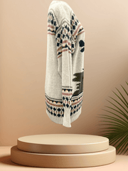 Side view of the Laurel Christmas Sweater showcasing festive patterns and cozy design, perfect for holiday celebrations.