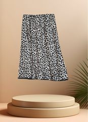 Marccain 2 Layers Leopard Print Skirt displayed against a minimal backdrop, featuring elegant two-layer design.