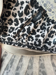 Inside view of Marccain's 2 Layers Leopard Print Skirt, featuring subtle leopard print and petticoat layer.