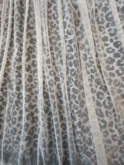 Close-up of Marccain's 2 Layers Leopard Print Skirt featuring subtle leopard print and layered tulle.