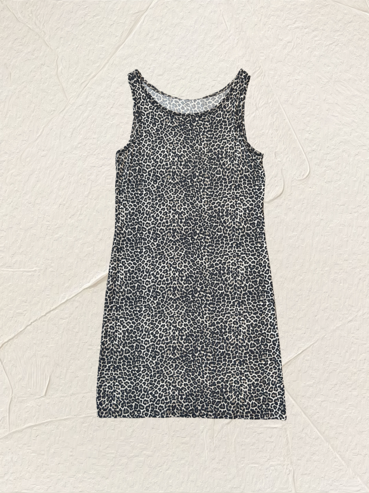Marccain leopard print dress showcasing a unique design with sleeveless style, ideal for versatile fashion statement.
