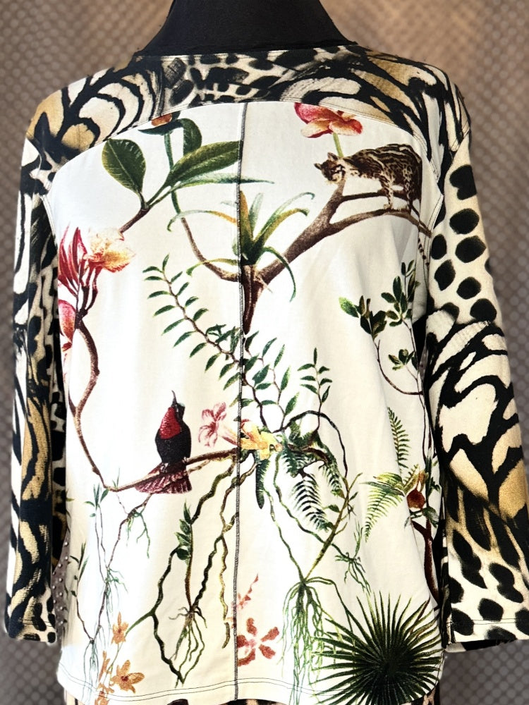 Marccain blouse featuring a unique animal figure print with botanical accents and stylish design elements.