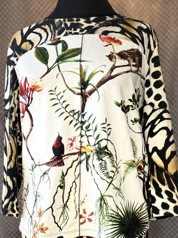 Marccain blouse featuring a unique animal figure print with botanical accents and stylish design elements.