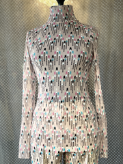 Marccain Blouse featuring signature patterns and transparent fabric, perfect for versatile styling options.