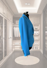 Marccain blue jacket showcased in a stylish wardrobe, featuring a tailored fit and professional design.