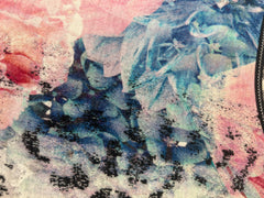 Close-up of Marccain Floral Leopard Print Wool Dress showcasing vibrant floral and leopard patterns.