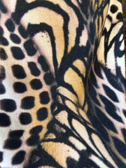 Close-up of Marccain Leopard Skirt fabric showcasing vivid leopard print pattern and texture.