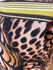 Close-up of the Marccain Leopard Skirt's vibrant leopard print and stylish striped waistband.