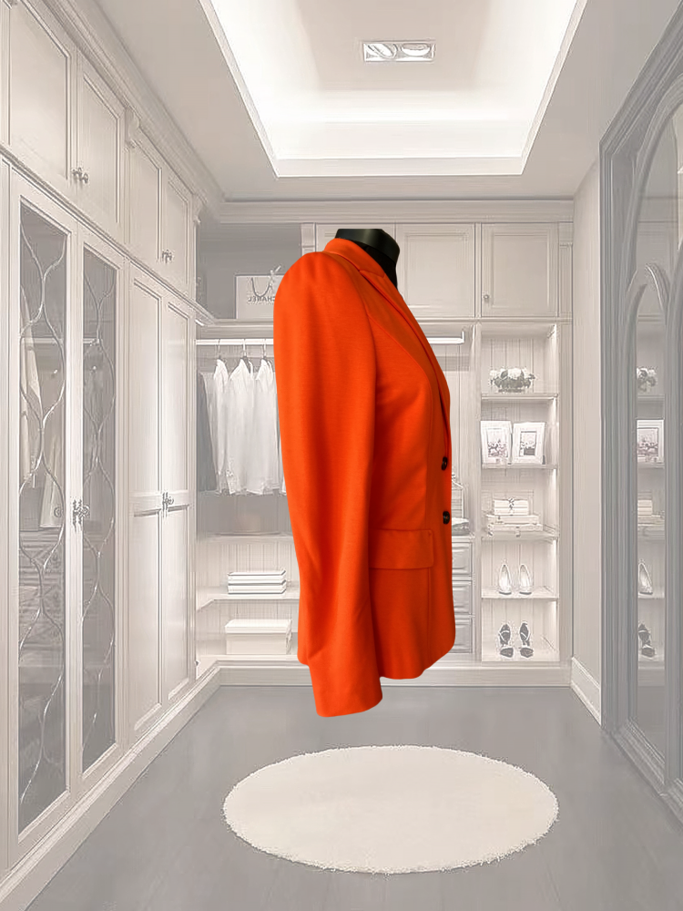 Marccain red jacket displayed in a stylish closet, showcasing its classic cut and fitted waistline.