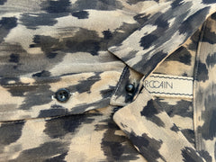 Close-up of Marccain Silk Leopard Print Shirt showcasing chic leopard print and stylish buttons.