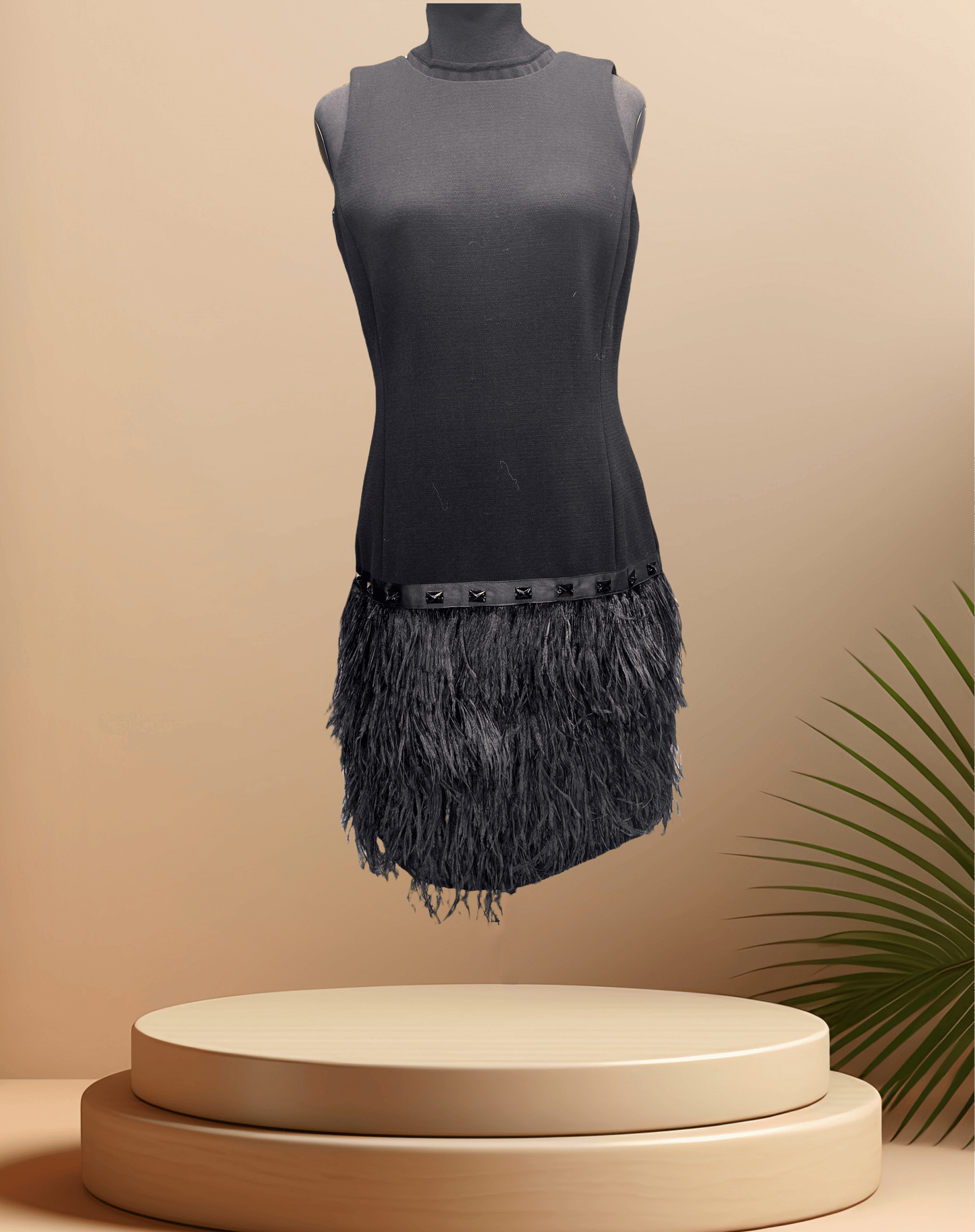 Michael Kors Black Feather Dress featuring a stylish feather skirt, perfect for elegant occasions.