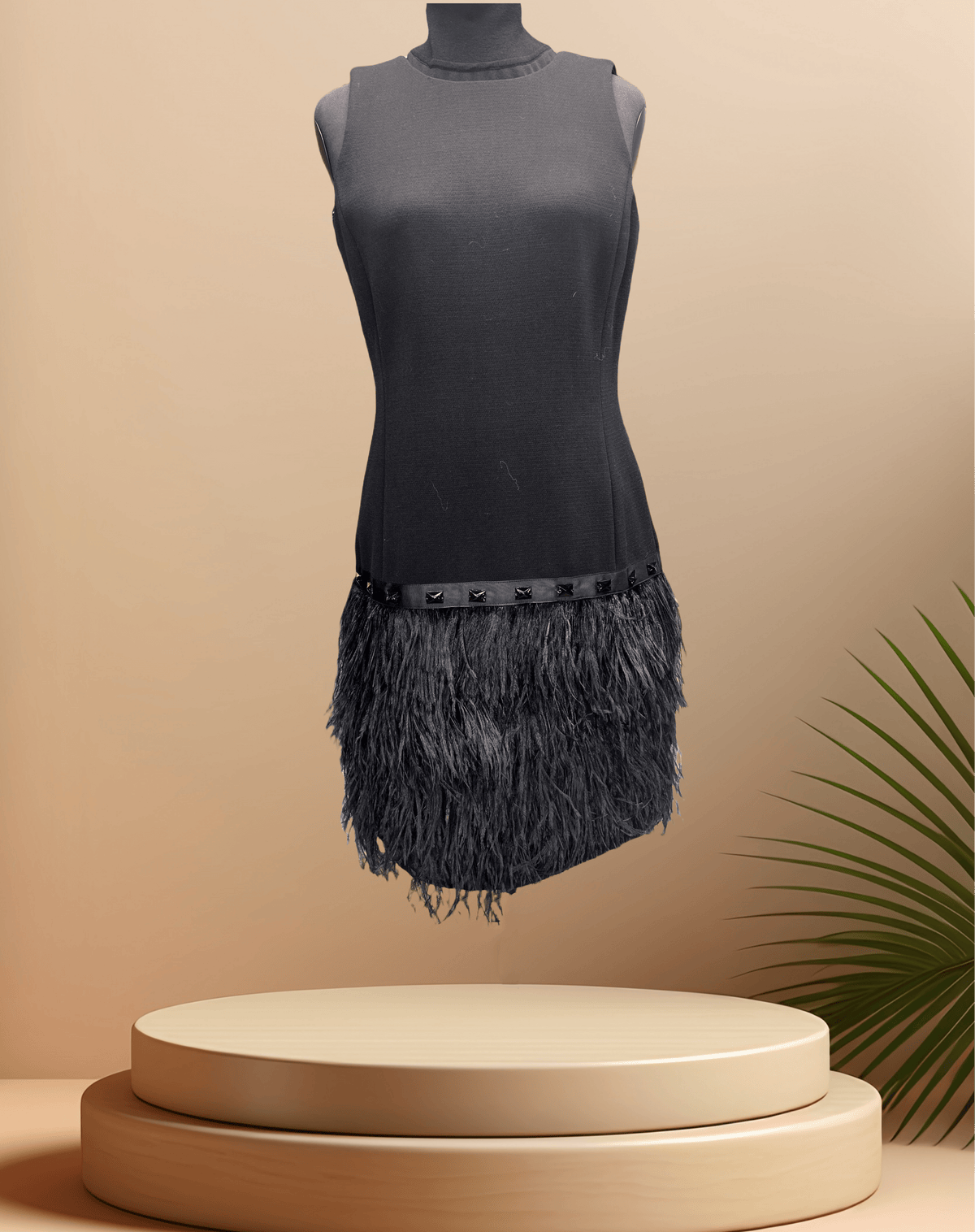 Michael Kors Black Feather Dress featuring a stylish feather skirt, perfect for elegant occasions.
