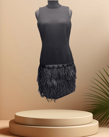 Michael Kors Black Feather Dress featuring a stylish feather skirt, perfect for elegant occasions.