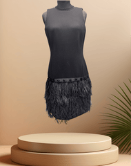 Michael Kors Black Feather Dress featuring a stylish feather skirt, perfect for elegant occasions.