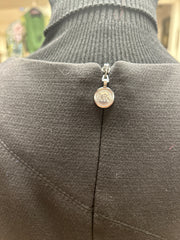 Back view of Michael Kors Rivet Dress showcasing the elegant zipper detail and iconic logo.